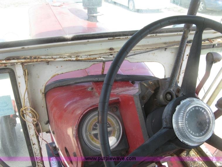 image for item J2835 International Farmall 806 tractor