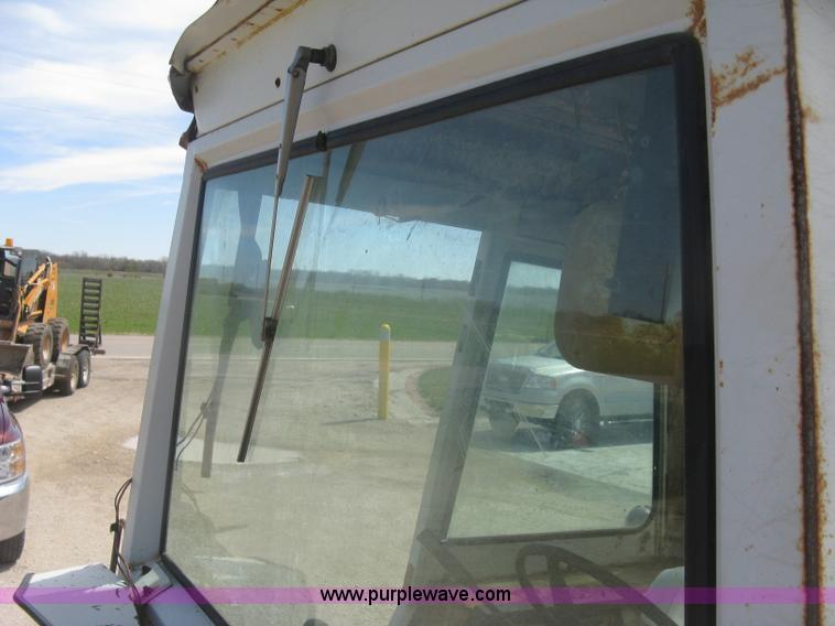 image for item J2835 International Farmall 806 tractor