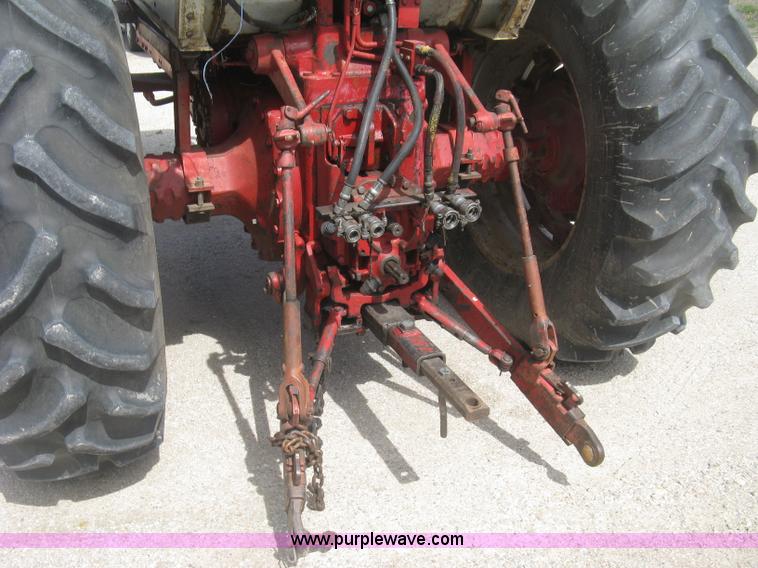 image for item J2835 International Farmall 806 tractor