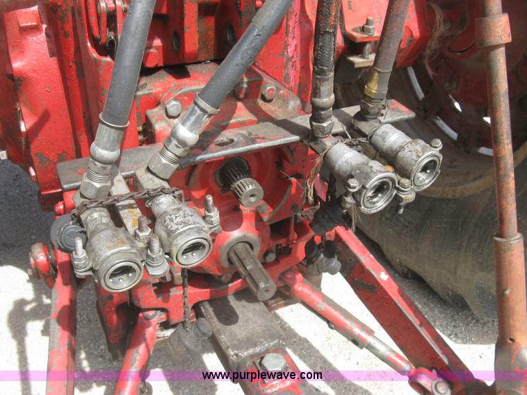 image for item J2835 International Farmall 806 tractor