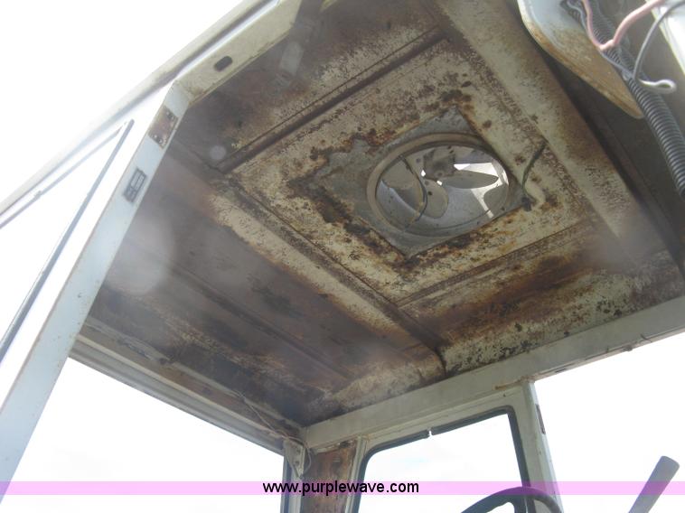 image for item J2835 International Farmall 806 tractor