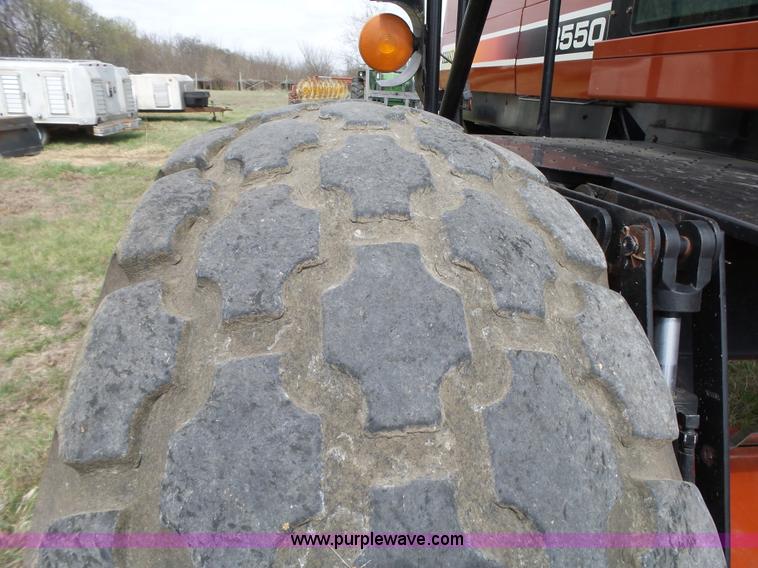 image for item L6292 2003 Hesston 8550S windrower