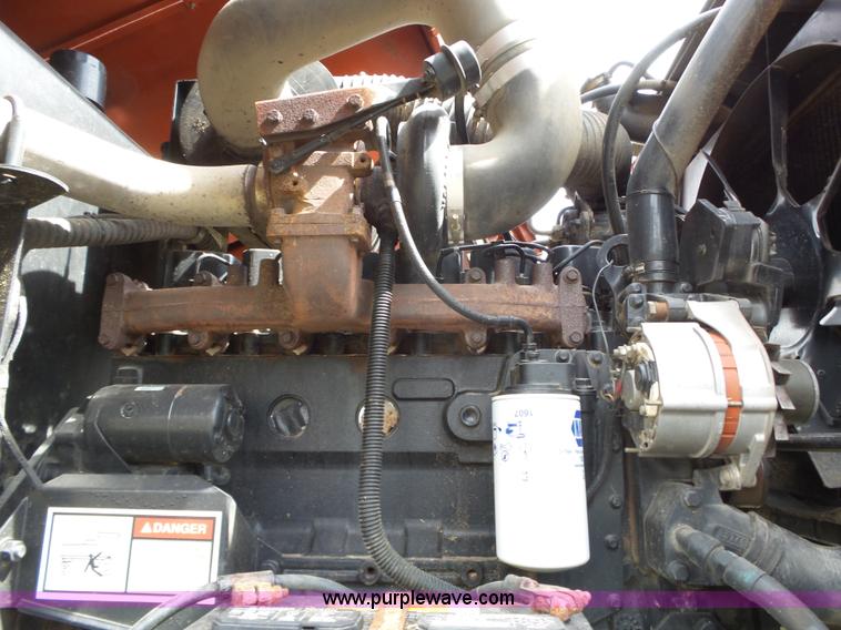 image for item L6292 2003 Hesston 8550S windrower