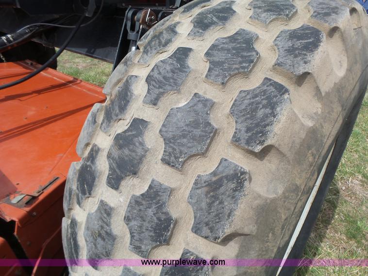 image for item L6292 2003 Hesston 8550S windrower