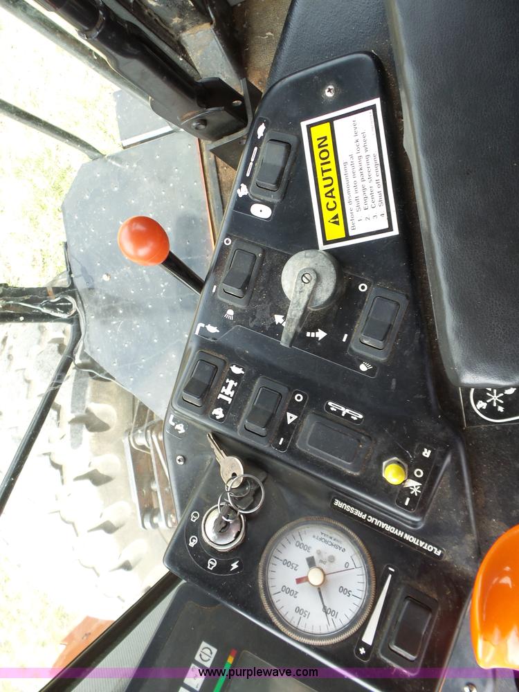 image for item L6292 2003 Hesston 8550S windrower