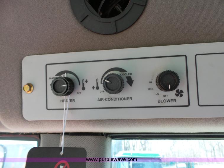 image for item L6292 2003 Hesston 8550S windrower