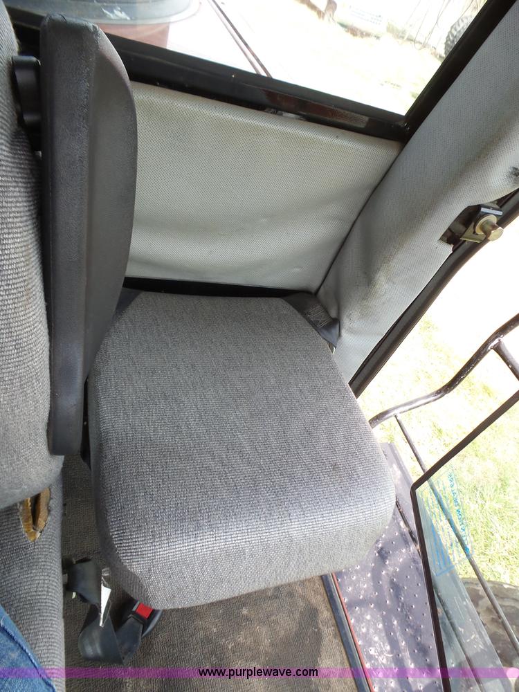 image for item L6292 2003 Hesston 8550S windrower