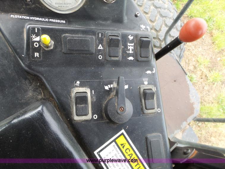 image for item L6298 1998 Case IH 8870 self-propelled windrower