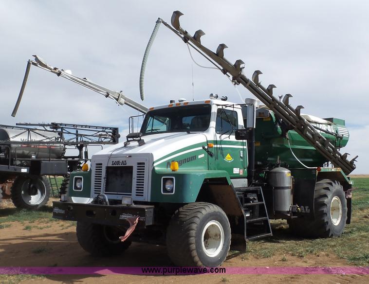 image for item L6529 1996 International 2554 Loral Magnum Air Max V applicator truck