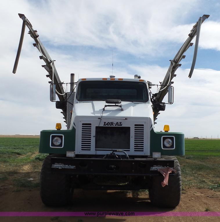 image for item L6529 1996 International 2554 Loral Magnum Air Max V applicator truck