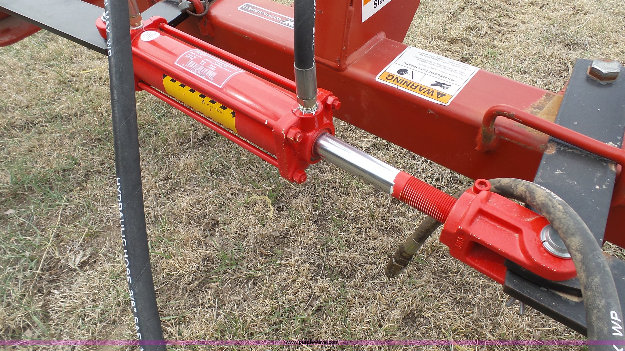 WorkSaver bale unroller in Norton, KS Item L2217 sold Purple Wave