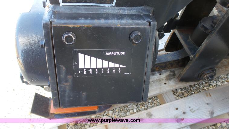 image for item AO9837 2006 Ditch Witch skid steer vibratory plow attachment