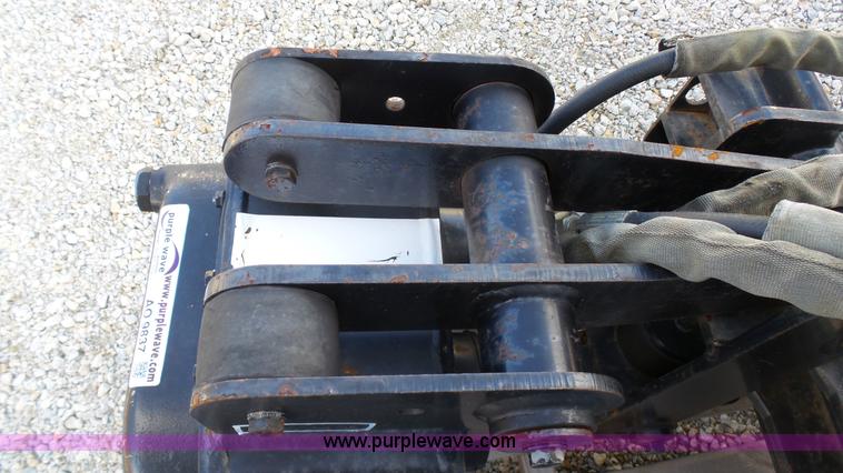 image for item AO9837 2006 Ditch Witch skid steer vibratory plow attachment