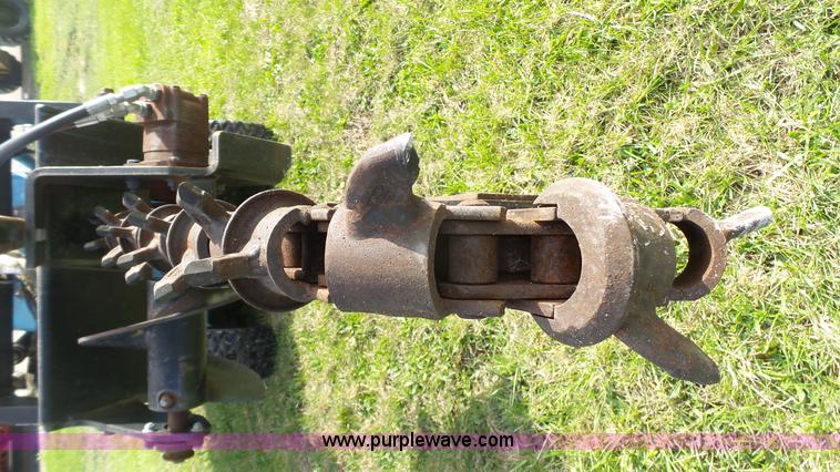 image for item AO9839 2004 Charles Machine Works Ditch Witch trencher attachment