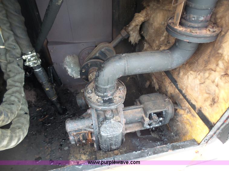 image for item AX9238 1995 Crafco EZ Pour 100D crack sealer