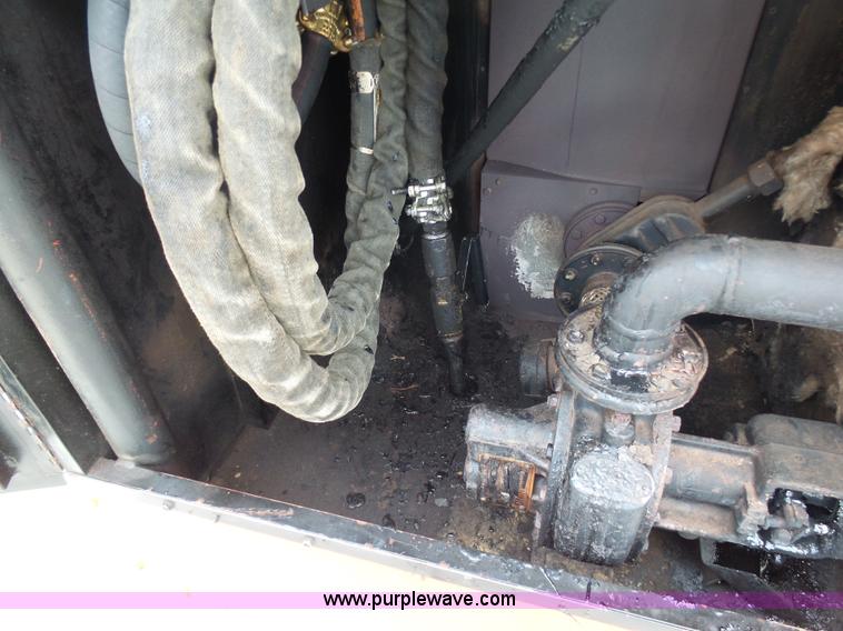 image for item AX9238 1995 Crafco EZ Pour 100D crack sealer