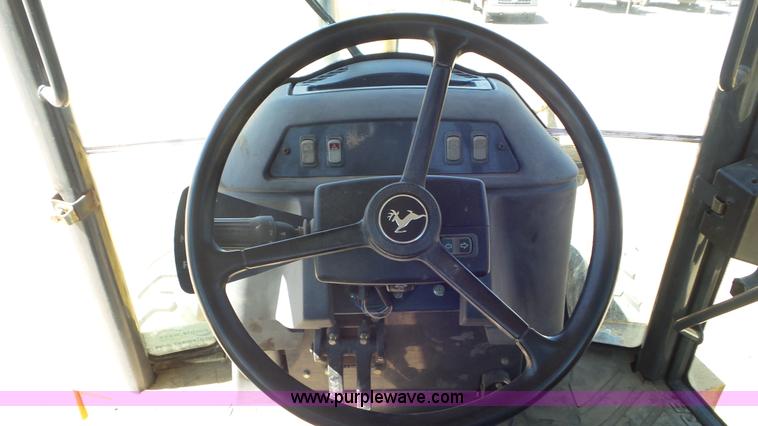 image for item J6123 2003 John Deere 310SG backhoe