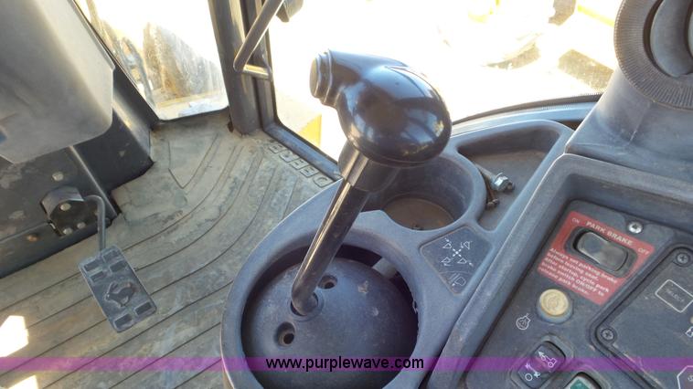 image for item J6123 2003 John Deere 310SG backhoe