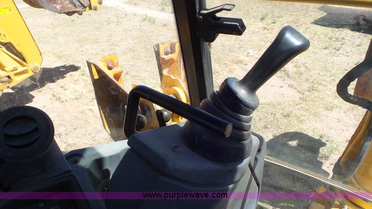 image for item J6123 2003 John Deere 310SG backhoe