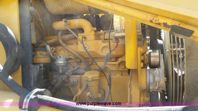 image for item J6123 2003 John Deere 310SG backhoe