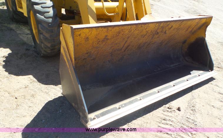 image for item J6123 2003 John Deere 310SG backhoe