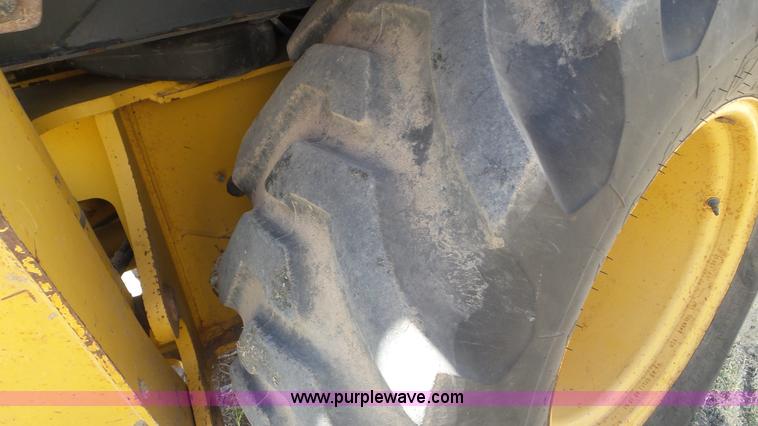 image for item J6123 2003 John Deere 310SG backhoe