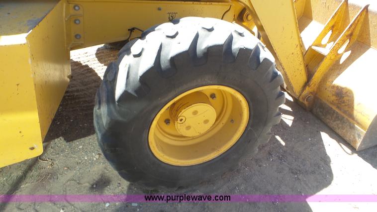 image for item J6123 2003 John Deere 310SG backhoe