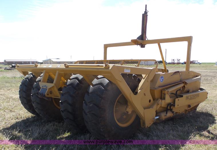 image for item J6154 2011 IMC 17C12 scraper