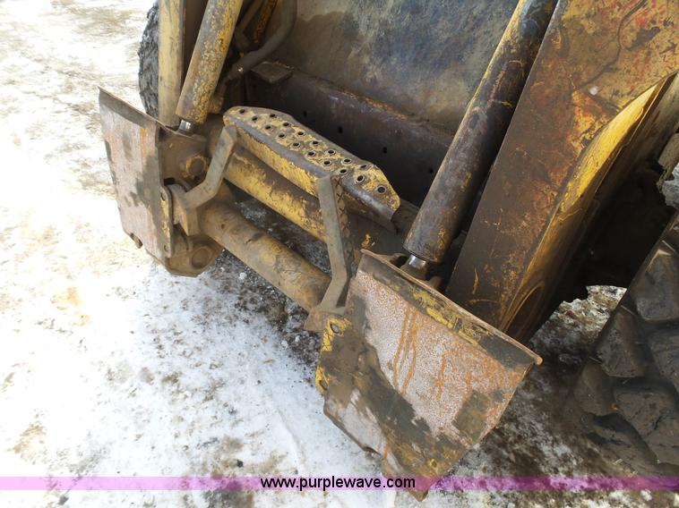 image for item K4573 1999 John Deere 240 skid steer