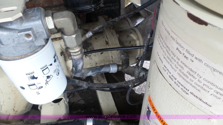 image for item K4634 1999 Ingersoll Rand P250 WJD air compressor