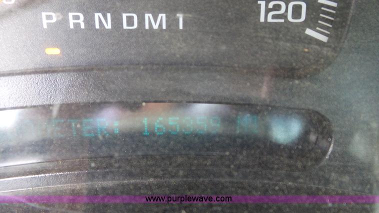 image for item L2186 2006 Chevrolet Silverado 3500 Crew Cab flatbed pickup truck