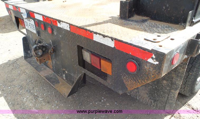 image for item L2186 2006 Chevrolet Silverado 3500 Crew Cab flatbed pickup truck