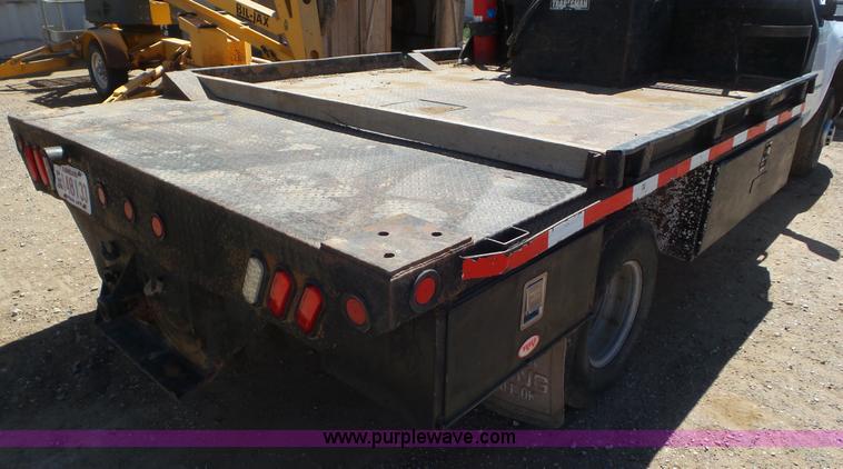 image for item L2190 2007 Chevrolet Silverado 3500HD flatbed pickup truck