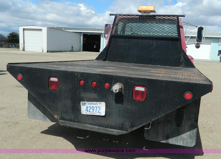 image for item J5131 1990 Ford F600 flatbed truck
