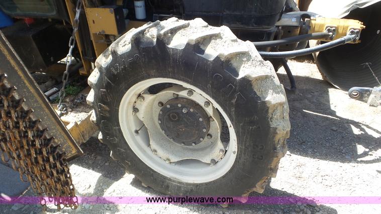 image for item K5203 2002 New Holland TS110 MFWD tractor