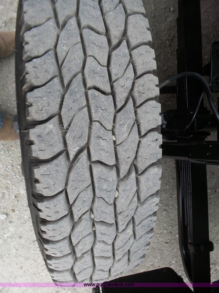 image for item L6296 2000 Isuzu W4500 refuse truck