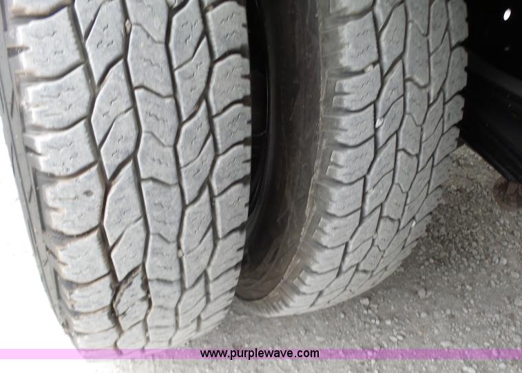 image for item L6296 2000 Isuzu W4500 refuse truck