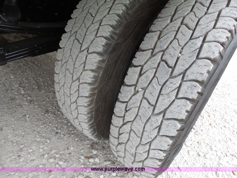 image for item L6296 2000 Isuzu W4500 refuse truck