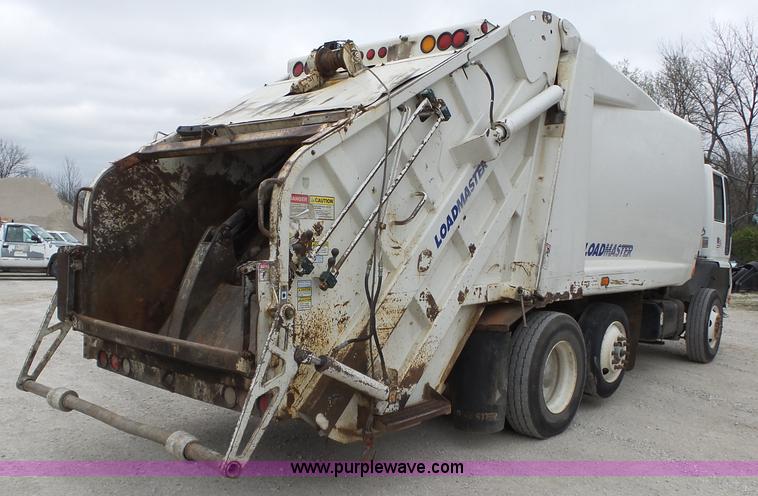 image for item L6297 2002 Sterling SC8000 refuse truck