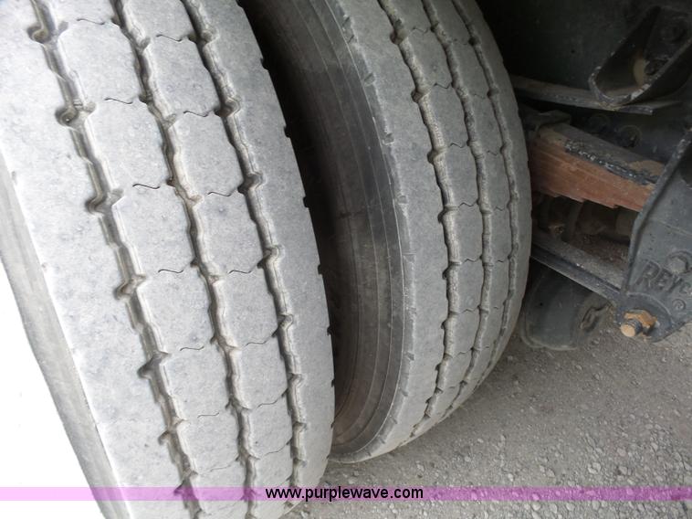 image for item L6297 2002 Sterling SC8000 refuse truck