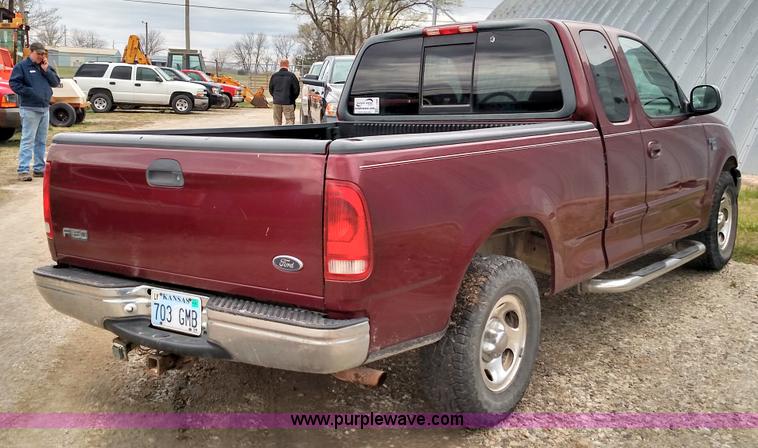 image for item L7440 1999 Ford F150 SuperCab pickup truck