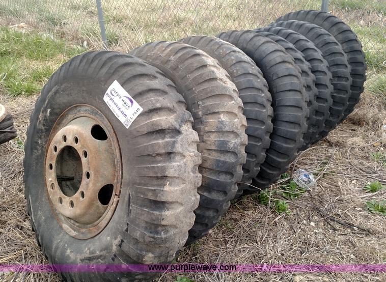 image for item L7449 (8) 11.00-20 tires and wheels