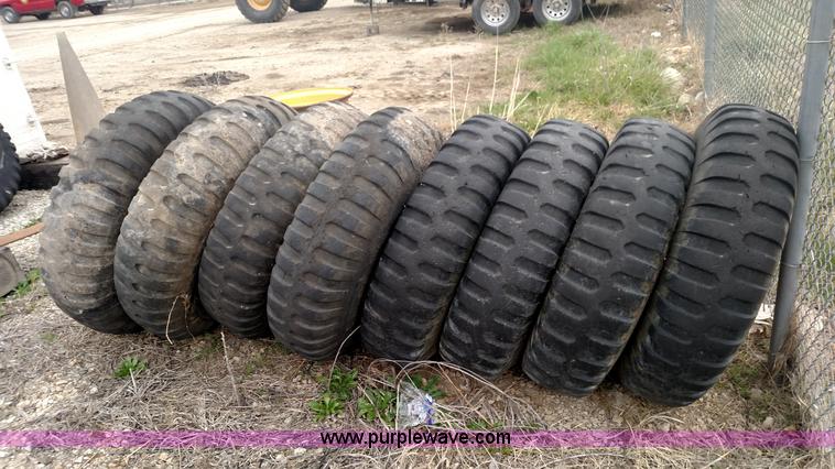 image for item L7449 (8) 11.00-20 tires and wheels