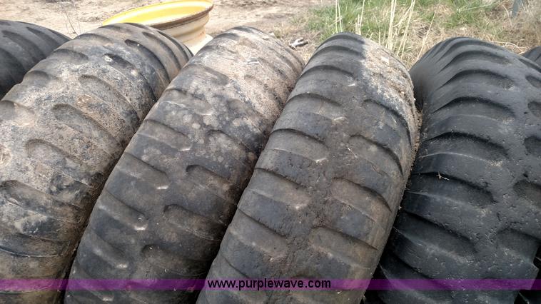 image for item L7449 (8) 11.00-20 tires and wheels