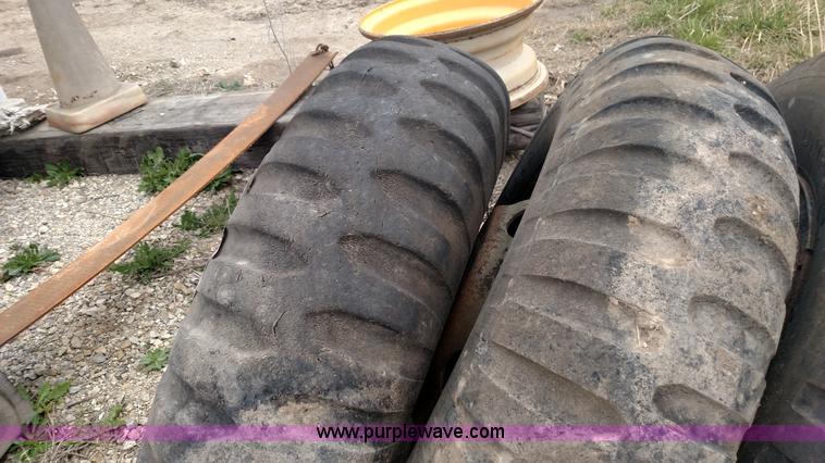 image for item L7449 (8) 11.00-20 tires and wheels