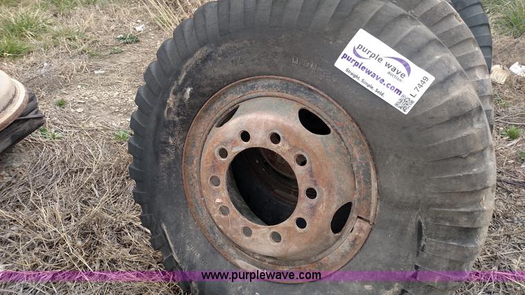 image for item L7449 (8) 11.00-20 tires and wheels