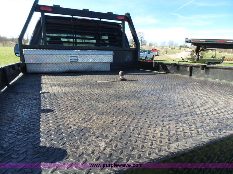 image for item BG9084 2000 Ford F250 Super Duty SuperCab flatbed pickup truck