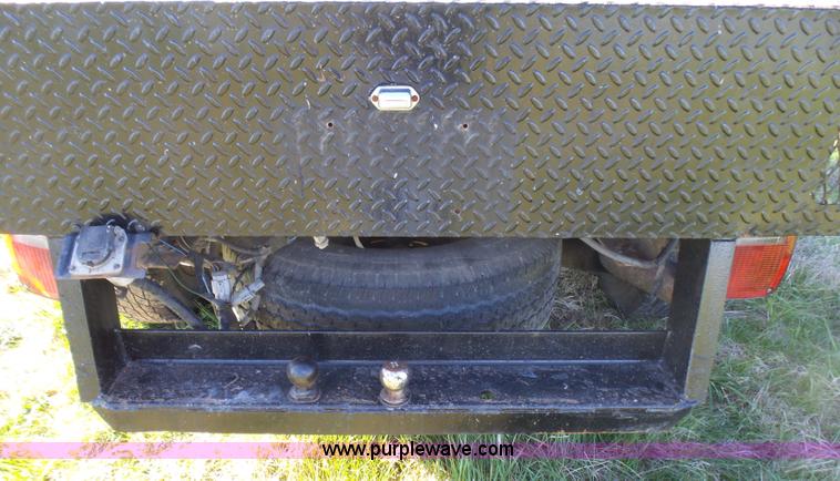 image for item BG9084 2000 Ford F250 Super Duty SuperCab flatbed pickup truck