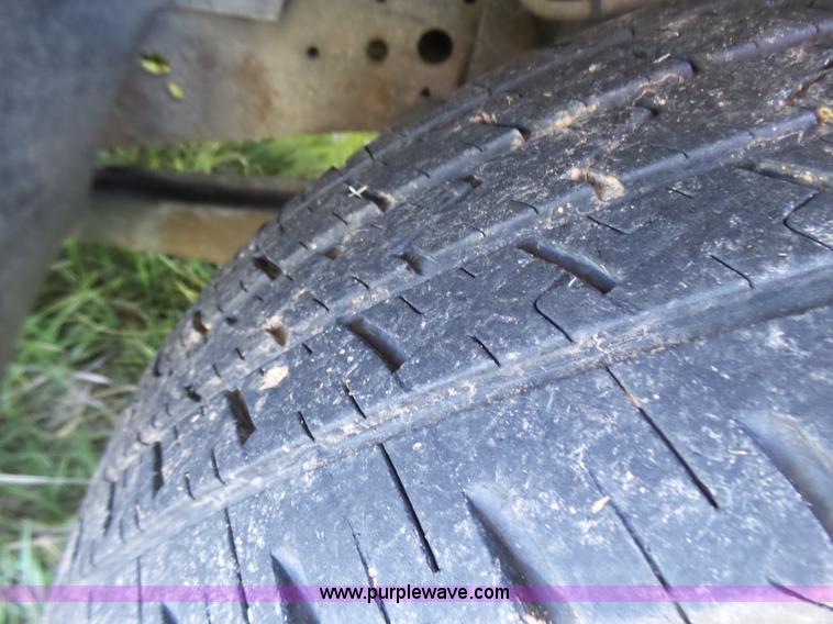 image for item BG9084 2000 Ford F250 Super Duty SuperCab flatbed pickup truck