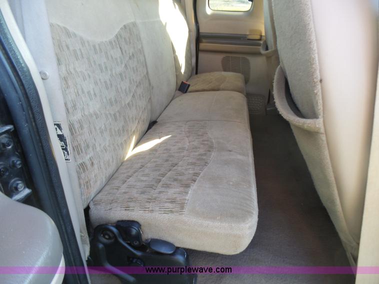 image for item BG9084 2000 Ford F250 Super Duty SuperCab flatbed pickup truck